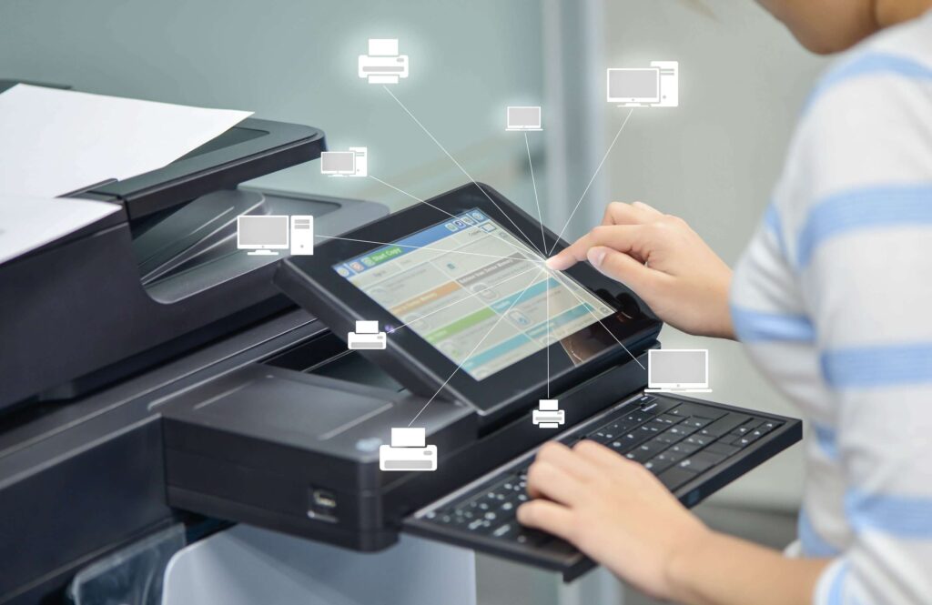 A person scanning a document for digital workflow