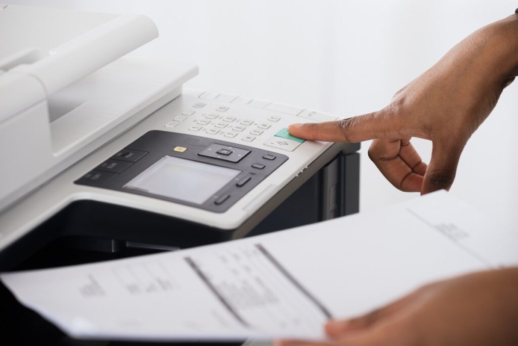 A person using an MFP