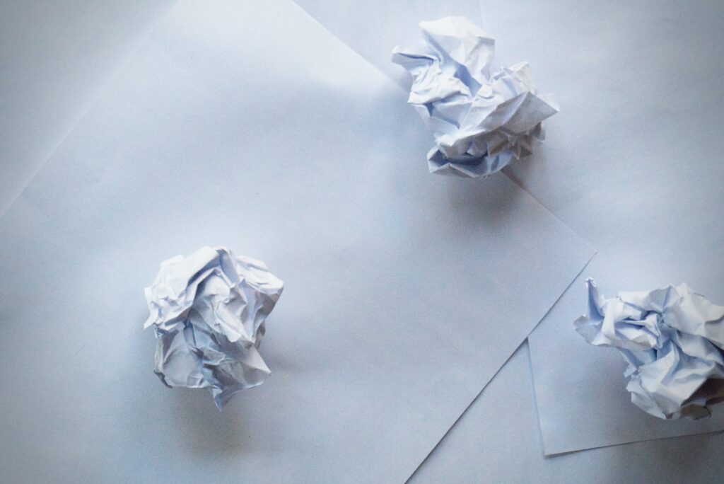 Crumpled papers on desk